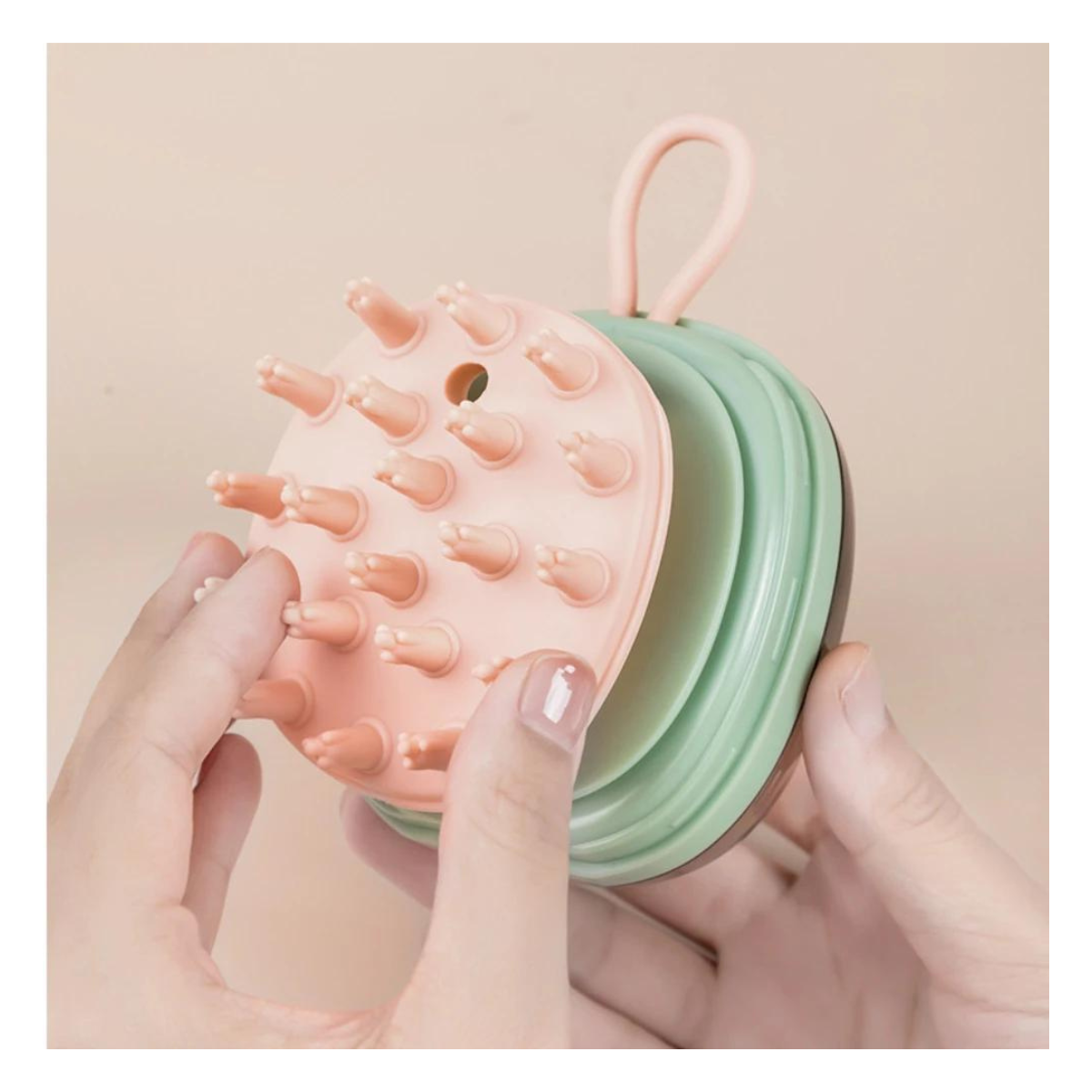 Cepillo de masaje capilar